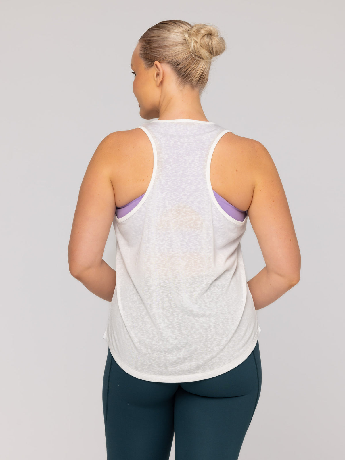 Brooke is wearing our Tank in size M. She is AUS 12.