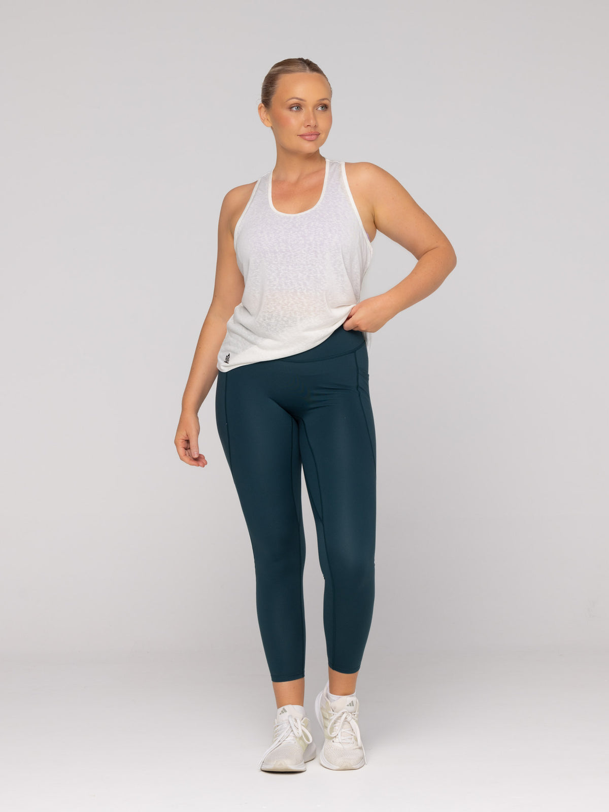 Brooke is wearing our Tank in size M. She is AUS 12.