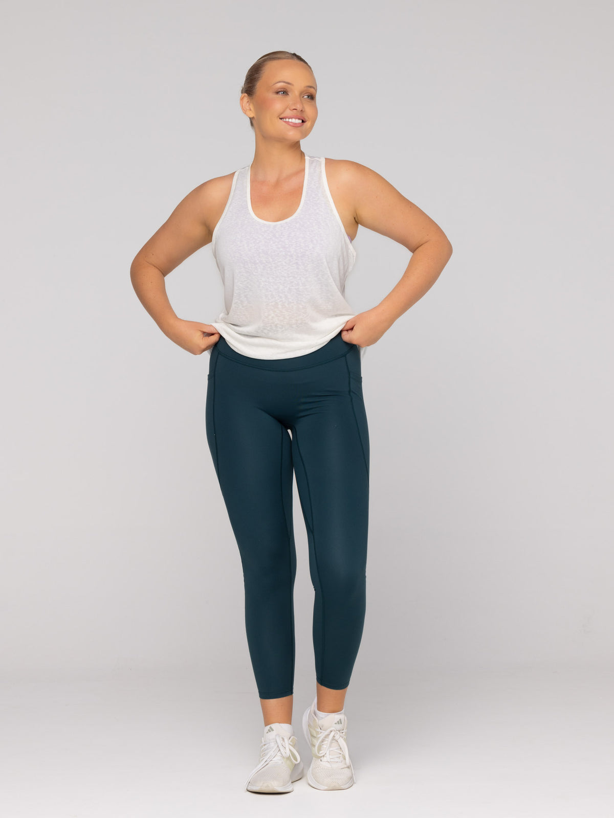 Brooke is wearing our Tank in size M. She is AUS 12.