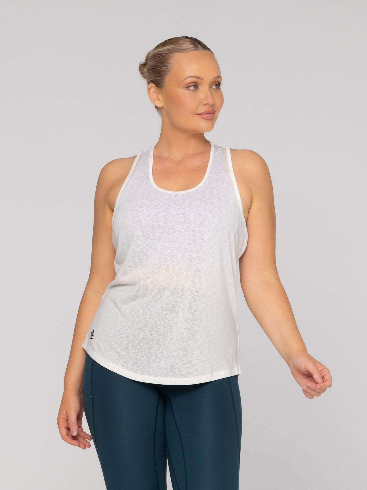 Brooke is wearing our Tank in size M. She is AUS 12.