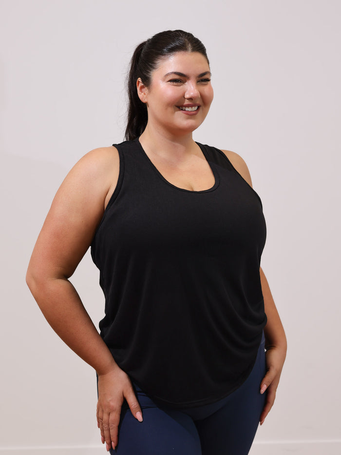 Maddie is wearing our Tank in size XC. She is AUS 16.