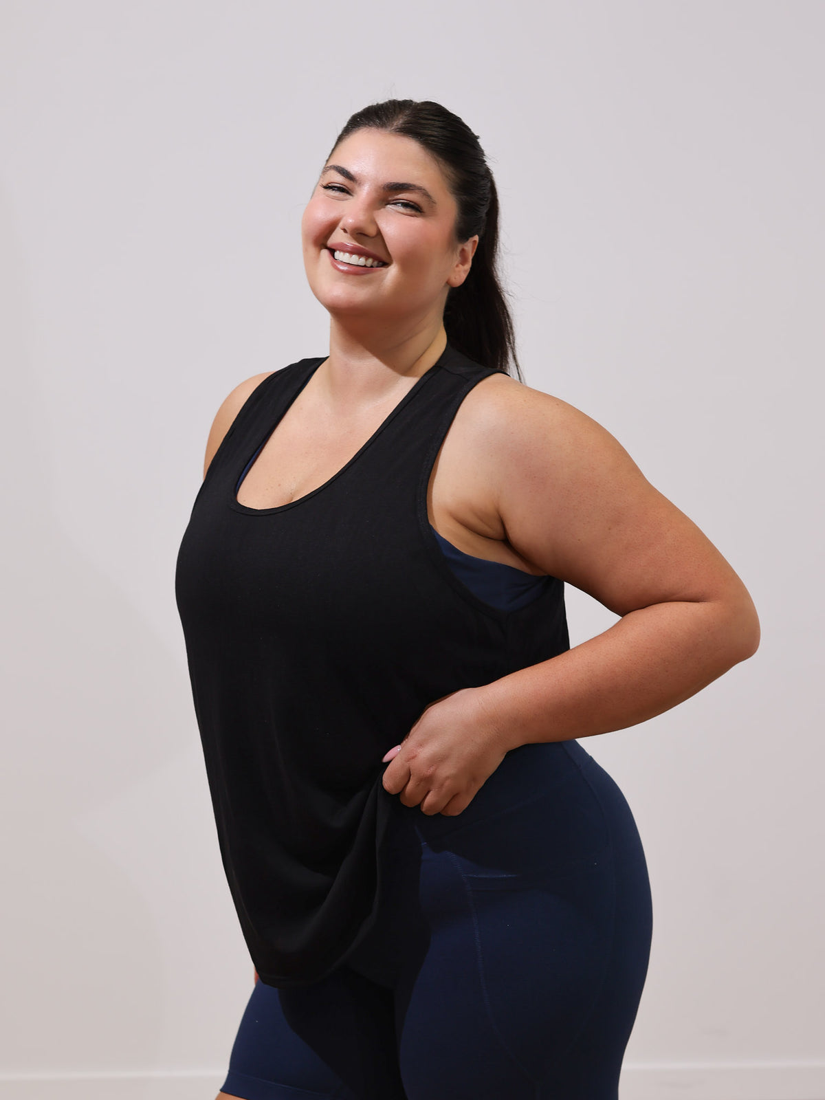 Maddie is wearing our Tank in size XC. She is AUS 16.