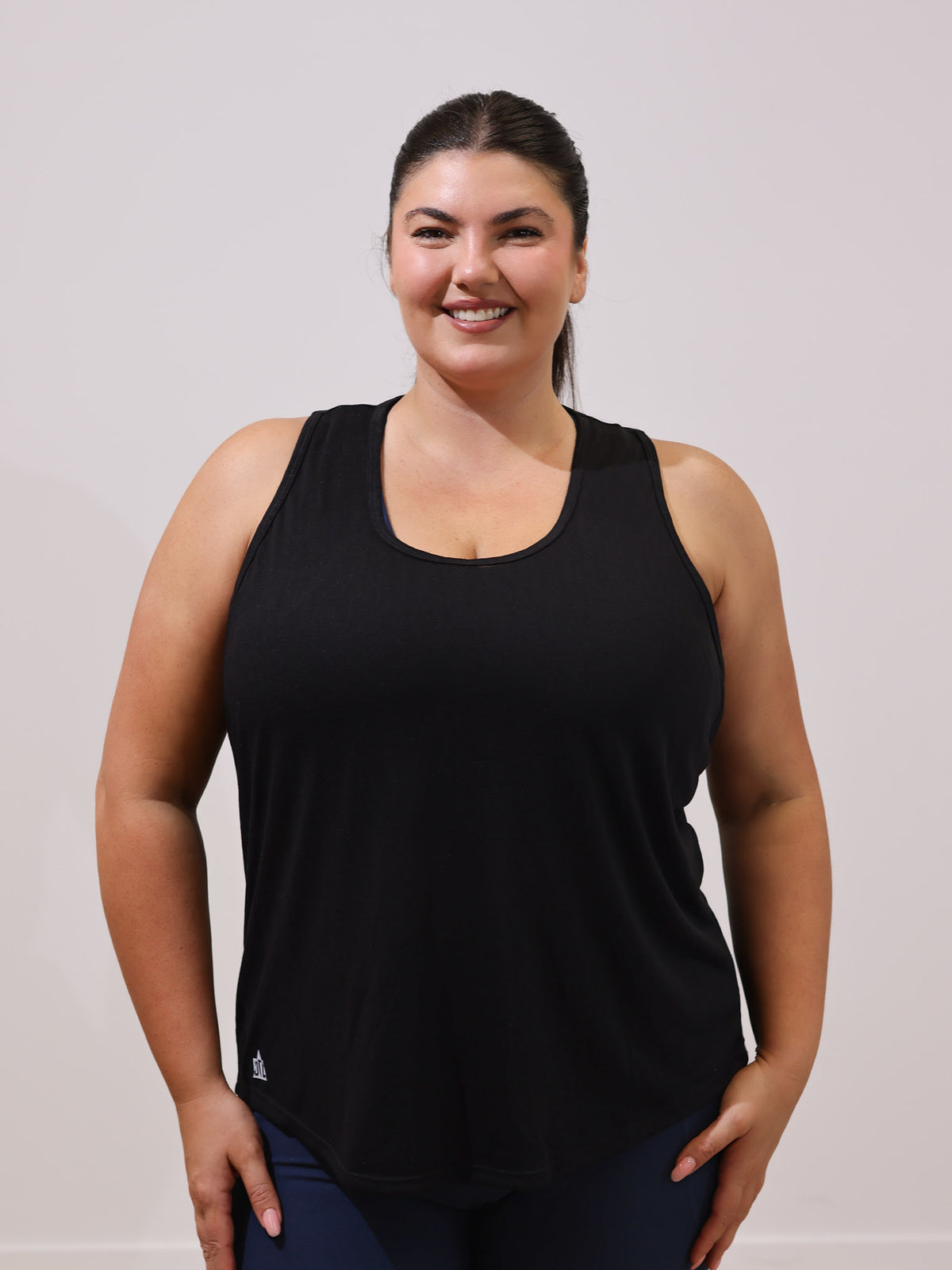 Maddie is wearing our Tank in size XC. She is AUS 16.