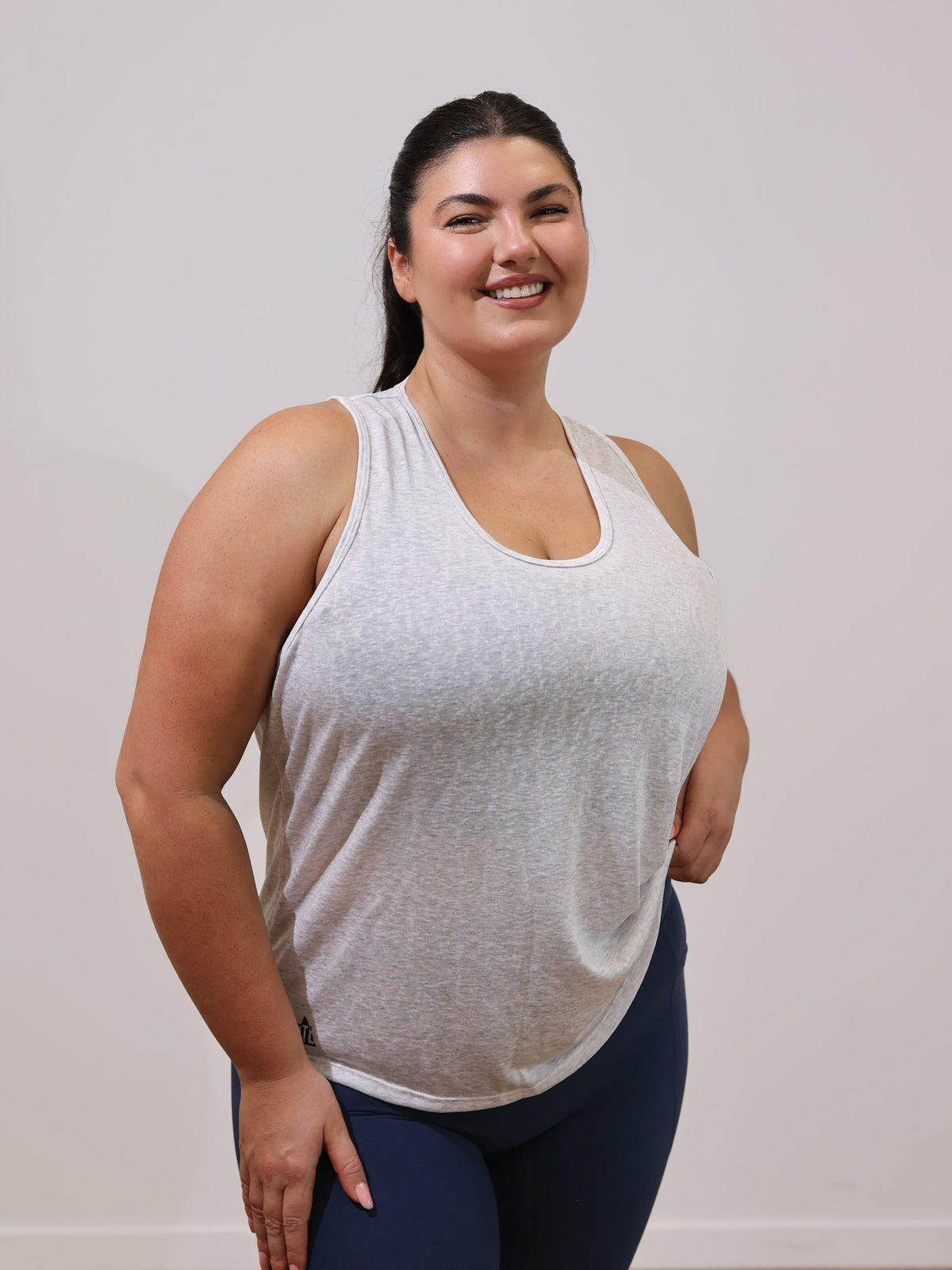 Maddie is wearing our Tank in size XC. She is AUS 16.
