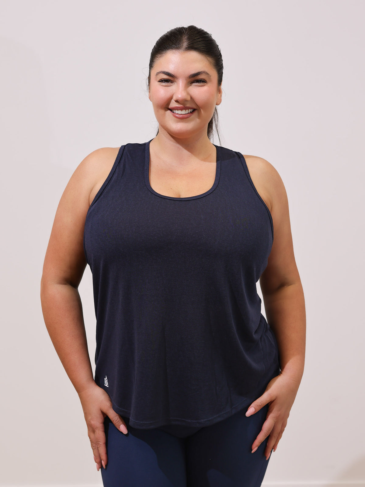 Maddie is wearing our Tank in size XC. She is AUS 16.