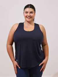 Maddie is wearing our Tank in size XC. She is AUS 16.