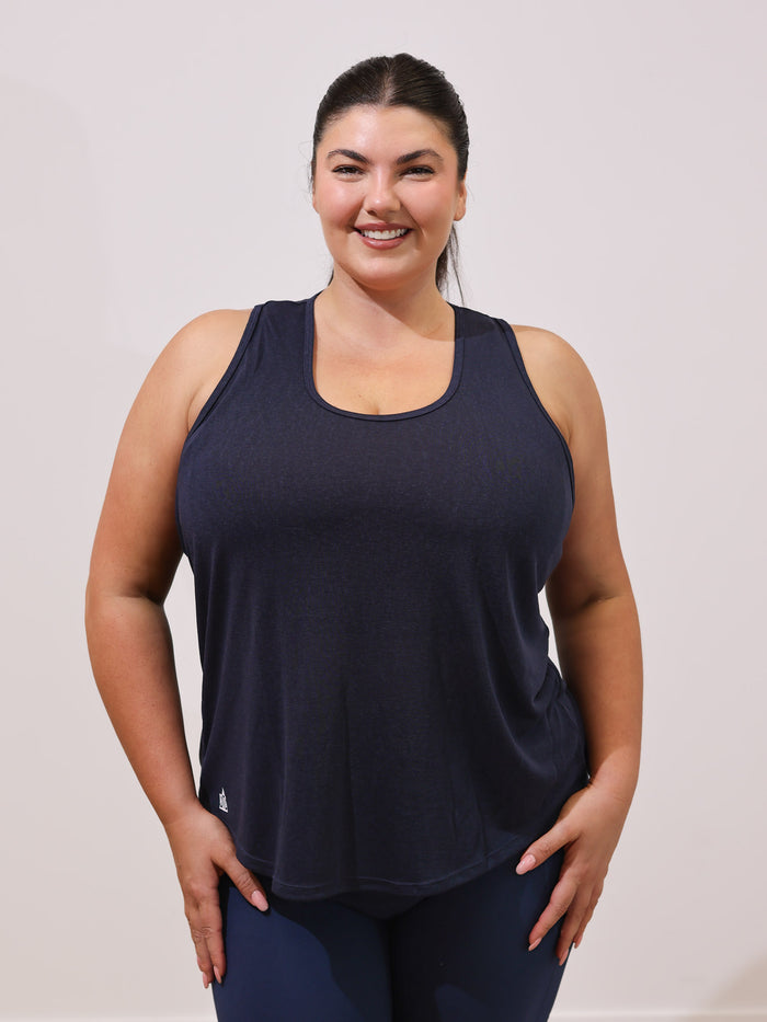 Maddie is wearing our Tank in size XC. She is AUS 16.