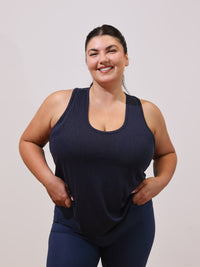 Maddie is wearing our Tank in size XC. She is AUS 16.