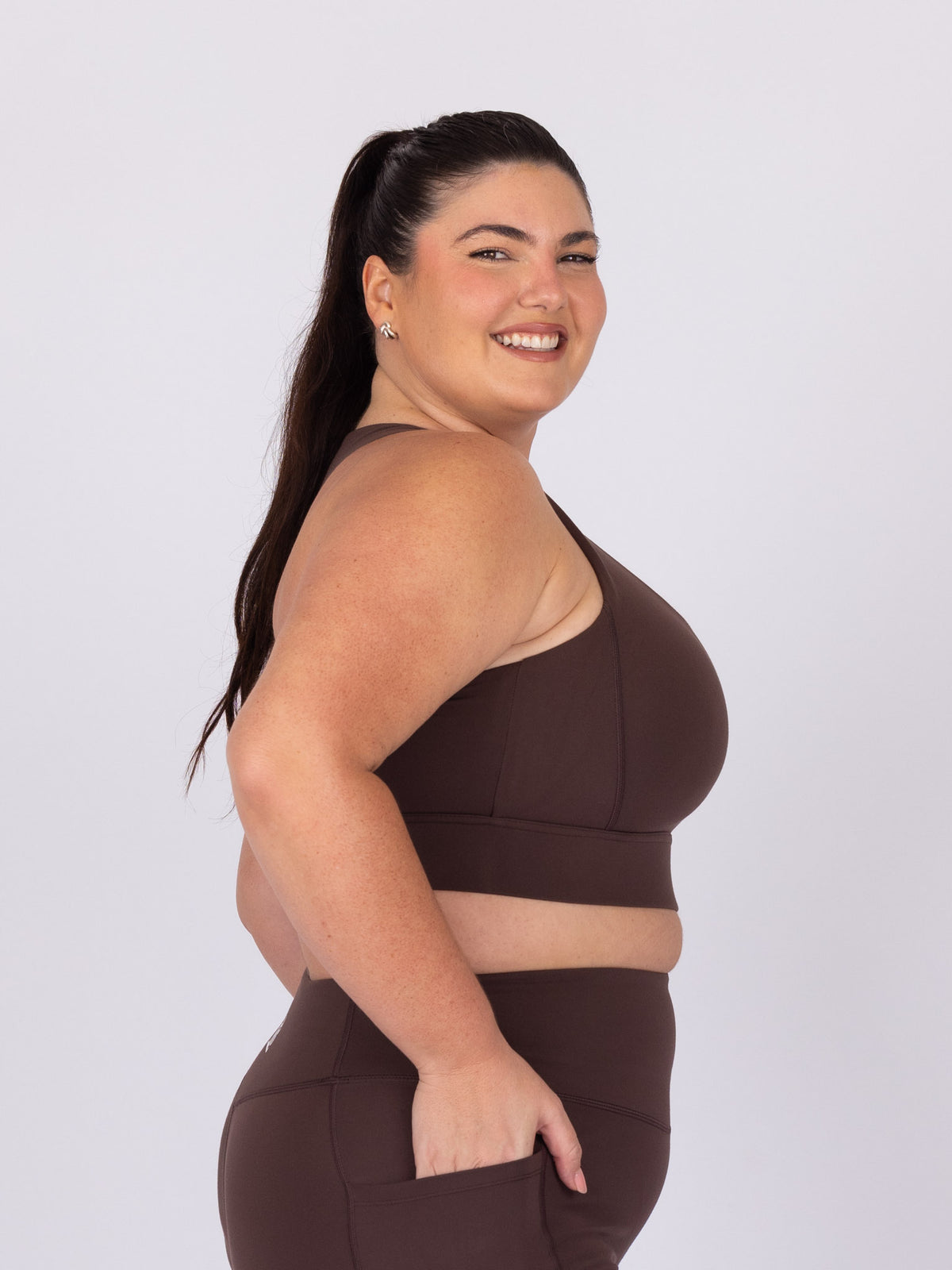 Maddie is wearing our Bra in size C - (E - HH). She is AUS 16, Cup F.