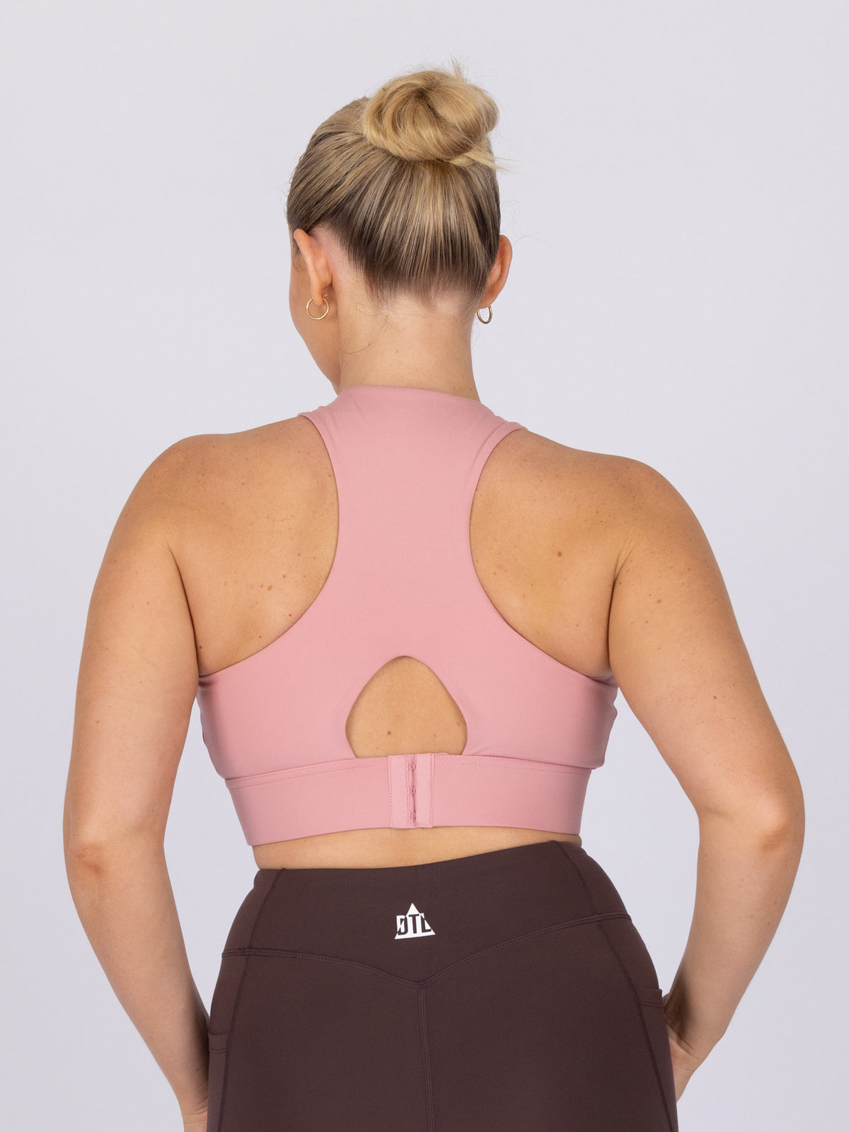 Brooke is wearing our Bra in size M (A - DD). She is AUS 12, Cup DD.