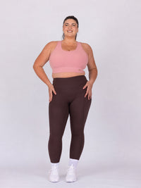 Maddie is wearing our Bra in size C - (E - HH). She is AUS 16, Cup F.