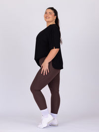 Maddie is wearing our Tee in size XC. She is AUS 16.