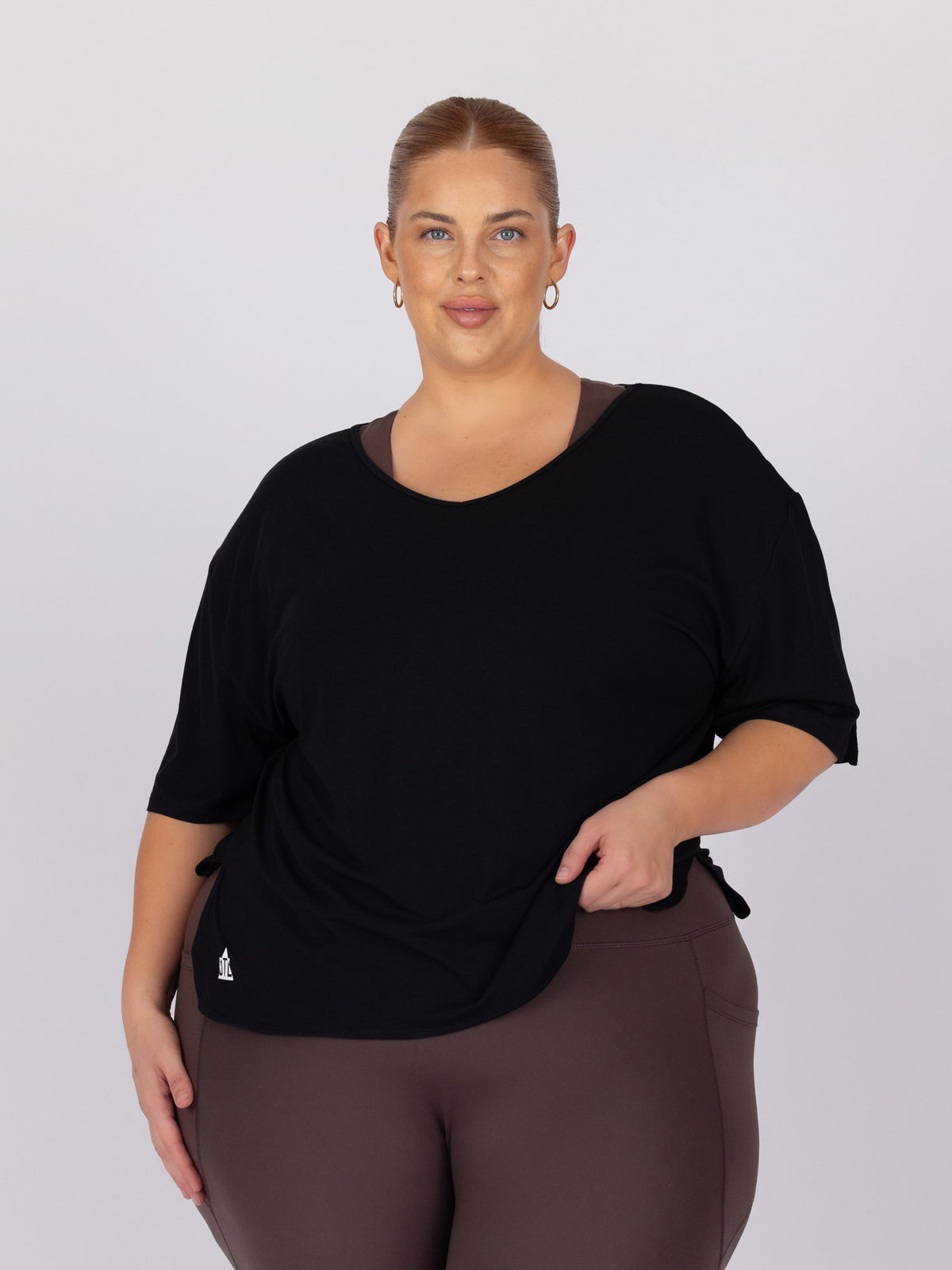 Kaleena is wearing our Tee in size XC. She is AUS 22-24.