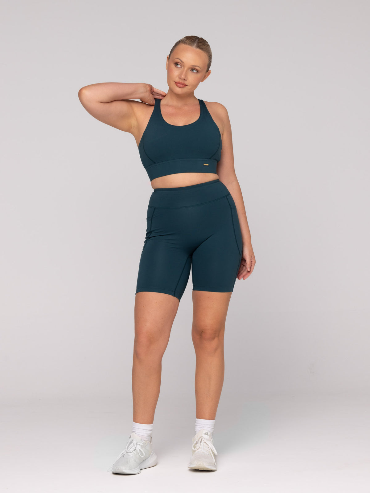 Brooke is wearing our Bra in size M (A - DD) and our Shorts in size M. She is AUS 12 and 172cm tall.