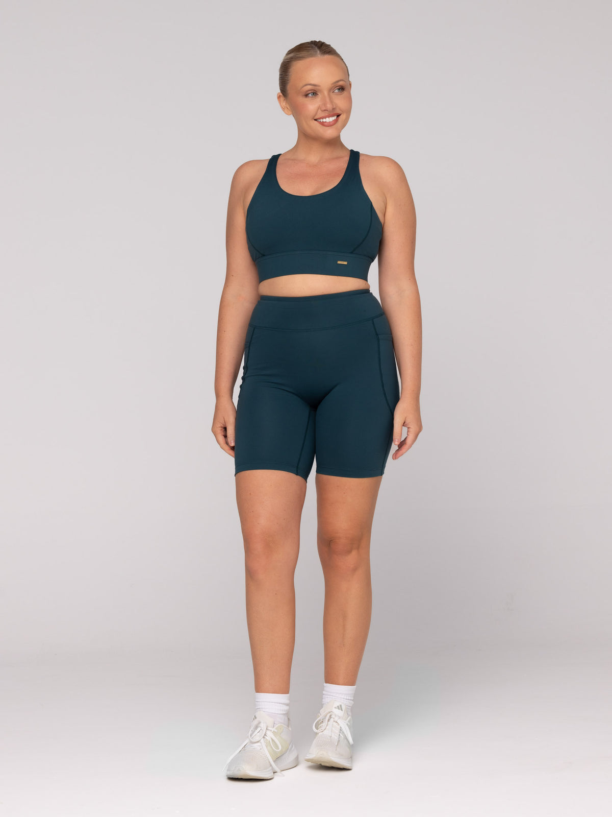 Brooke is wearing our Bra in size M (A - DD) and our Shorts in size M. She is AUS 12 and 172cm tall.