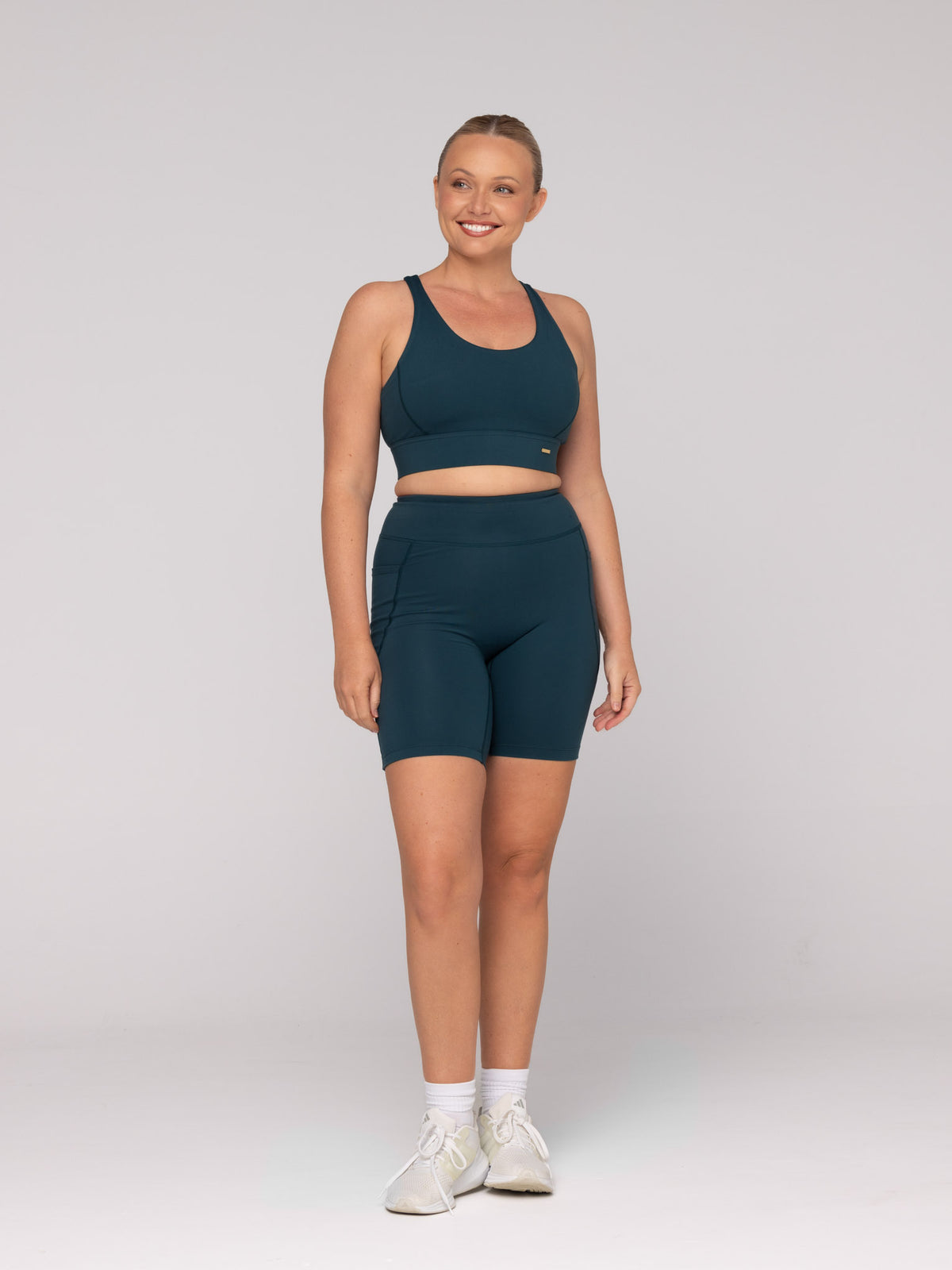 Brooke is wearing our Bra in size M (A - DD) and our Shorts in size M. She is AUS 12 and 172cm tall.
