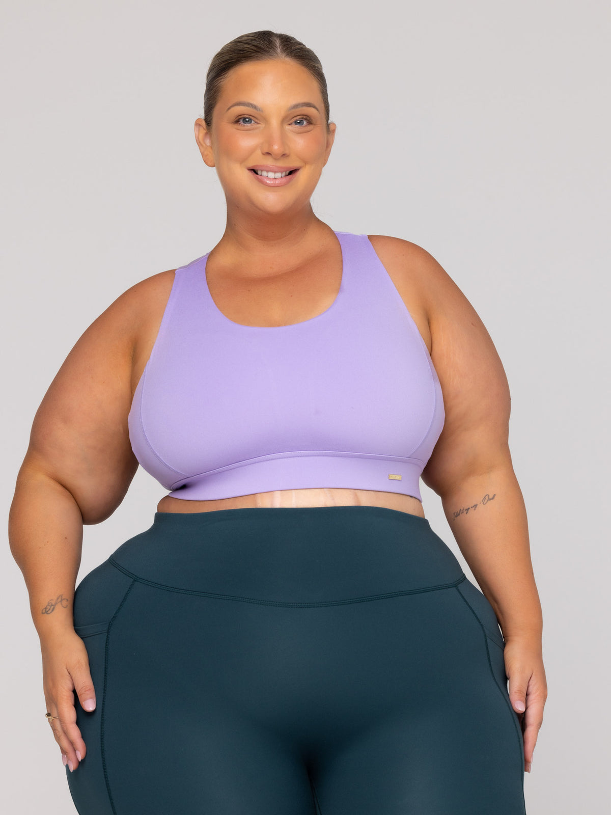 Shae is wearing our Bra in size 3XC (E-HH). She is AUS 22-24, Cup F.