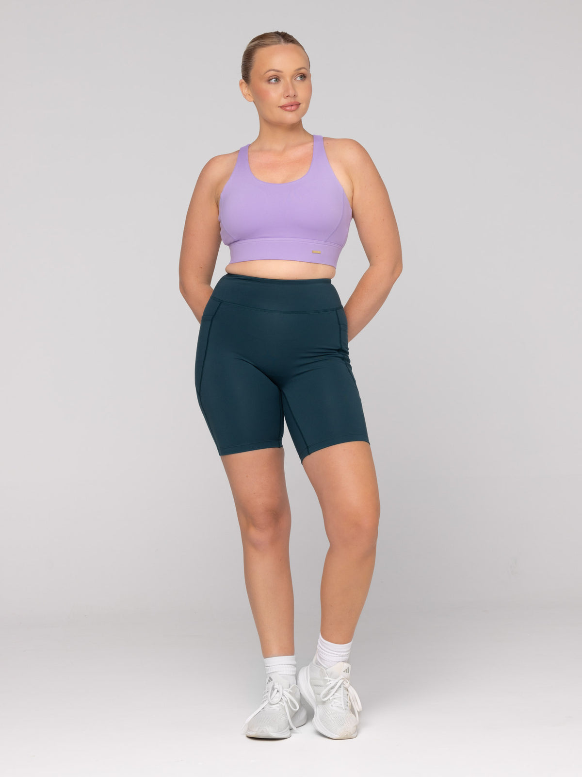 Brooke is wearing our Bra in size M (A - DD) and our Shorts in size M. She is AUS 12 and 172cm tall.