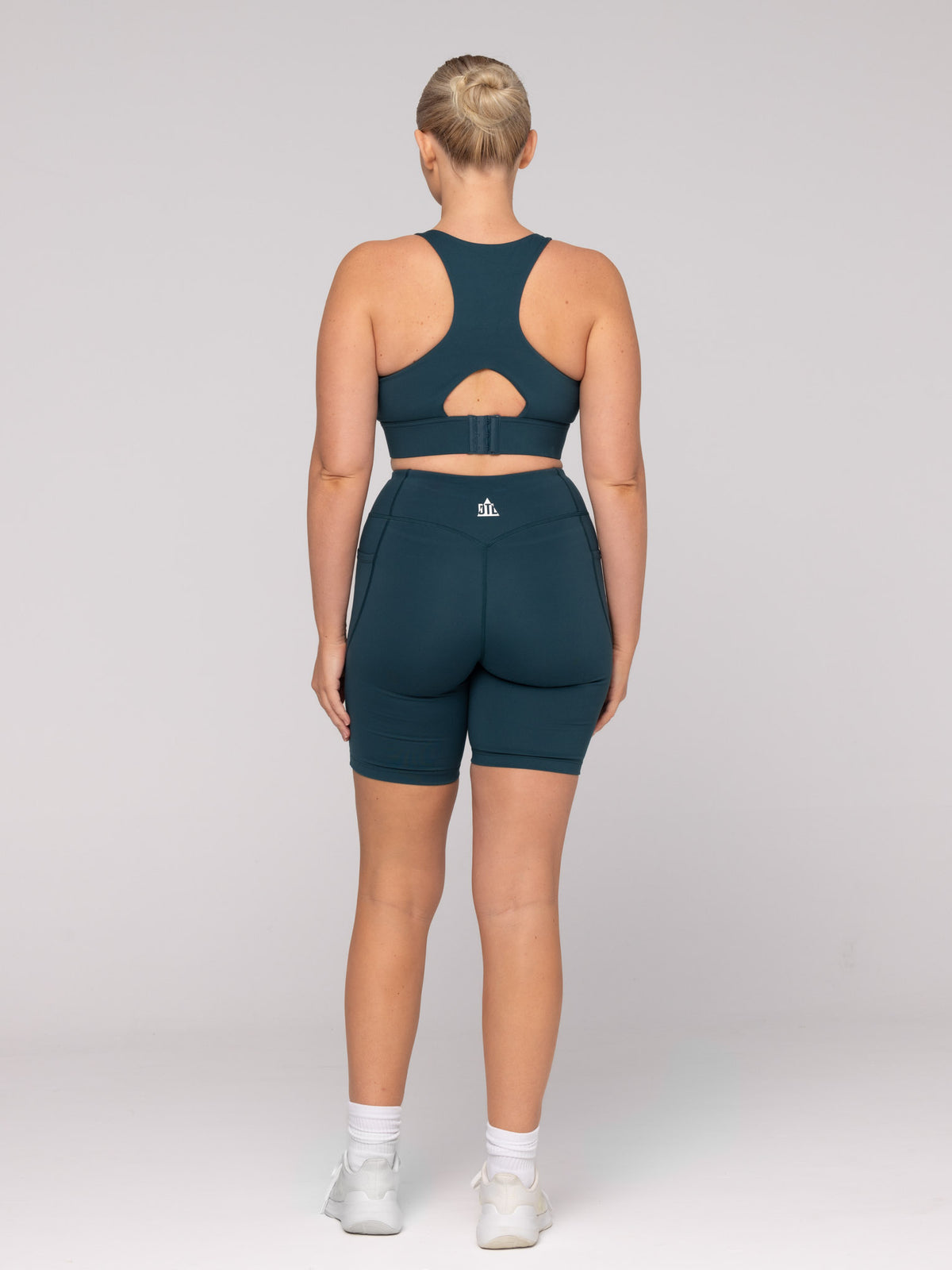 Brooke is wearing our Bra in size M (A - DD) and our Shorts in size M. She is AUS 12 and 172cm tall.