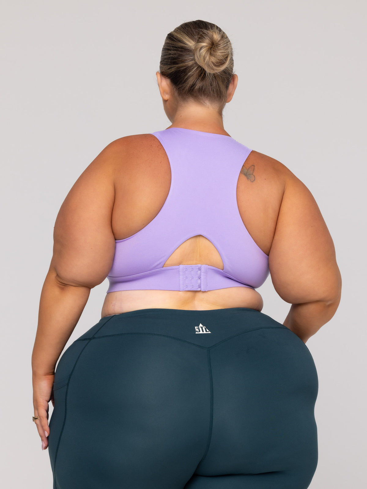 Shae is wearing our Bra in size 3XC (E-HH). She is AUS 22-24, Cup F.