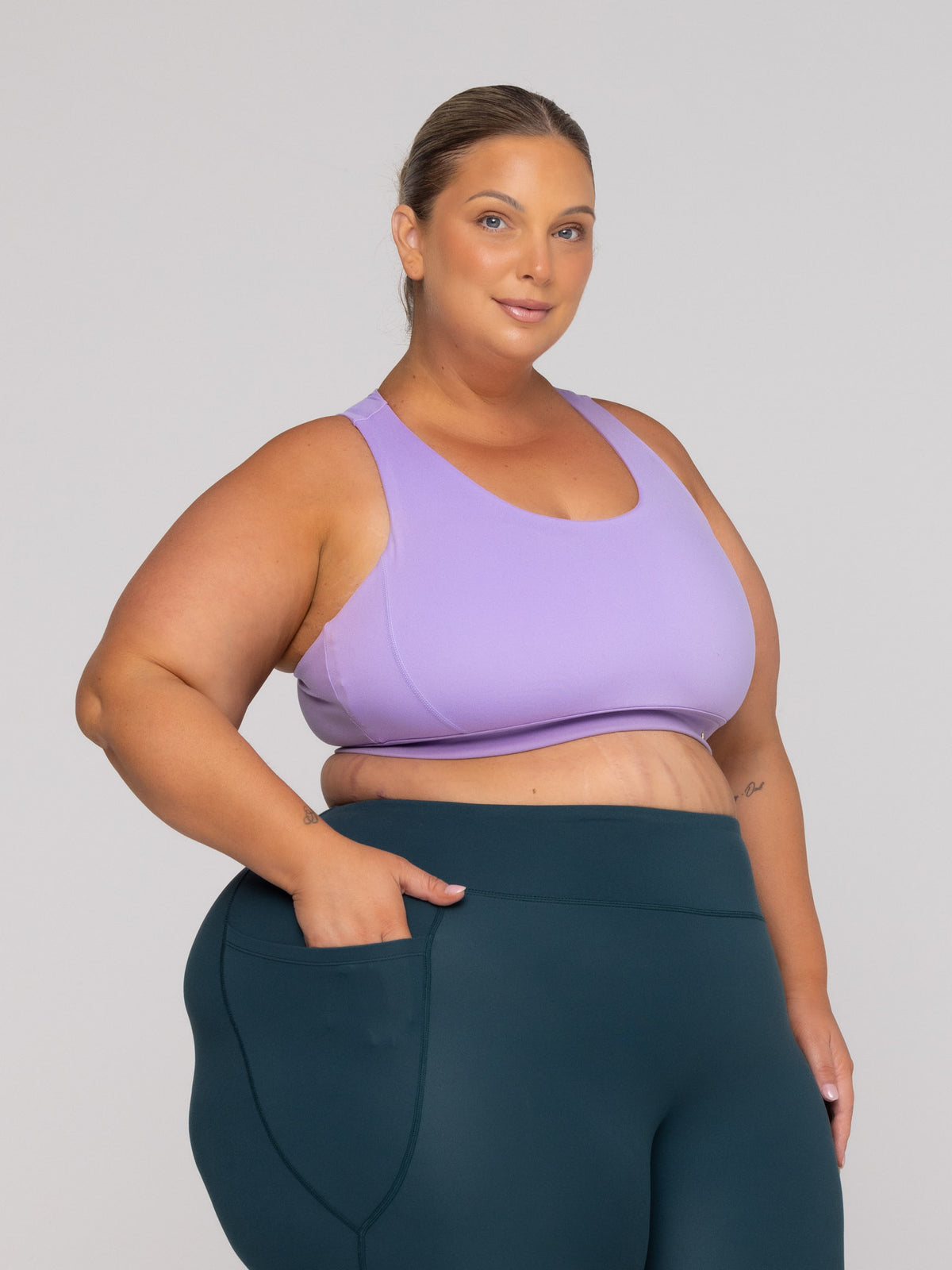 Shae is wearing our Bra in size 3XC (E-HH). She is AUS 22-24, Cup F.