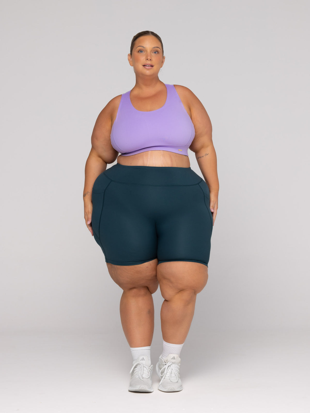 Shae is wearing our Bra in size 3XC (E-HH) and our Shorts in size 3XC. She is AUS 22-24 and 167cm tall.