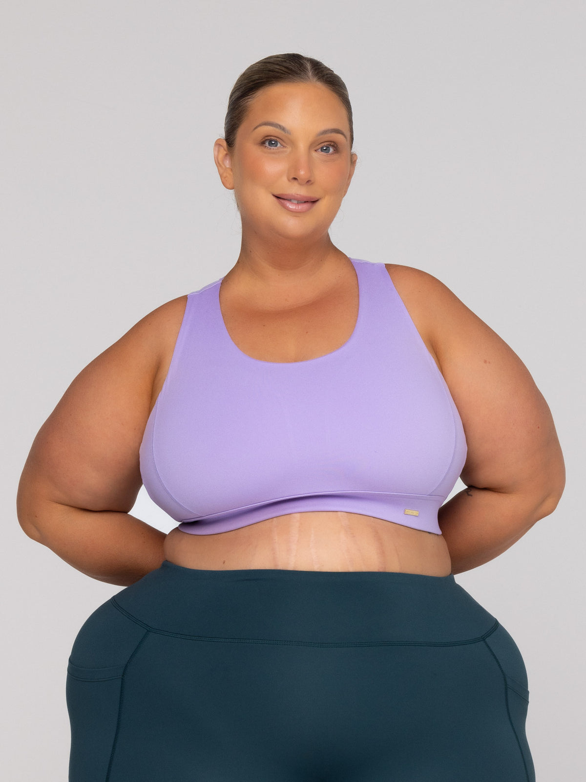 Shae is wearing our Bra in size 3XC (E-HH) and our Shorts in size 3XC. She is AUS 22-24 and 167cm tall.